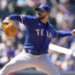 
              Texas Rangers starting pitcher Martin Perez works against the Colorado Rockies in the second inning of a baseball game Wednesday, Aug. 24, 2022, in Denver. (AP Photo/David Zalubowski)
            