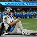 
              Carolina Panthers quarterback Sam Darnold leaves the field on a cart after getting injured during the second half of an NFL preseason football game against the Buffalo Bills on Friday, Aug. 26, 2022, in Charlotte, N.C. (AP Photo/Jacob Kupferman)
            