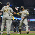 
              CORRECTS TO TWO-RUN, INSTEAD OF SOLO, HOME RUN - San Diego Padres' Trent Grisham, right, celebrates with Austin Nola (26) after hitting a two-run home run against the San Francisco Giants during the seventh inning of a baseball game in San Francisco, Tuesday, Aug. 30, 2022. (AP Photo/Godofredo A. Vásquez)
            