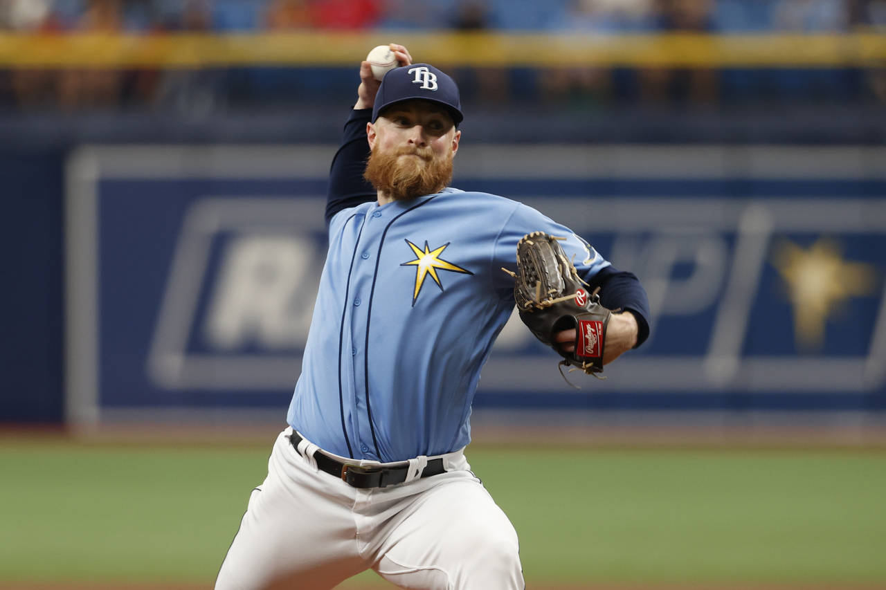 Tampa Bay Rays starting pitcher Drew Rasmussen throws to a Los Angeles Angels batter during the fir...
