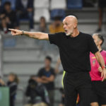 
              Milan's coach Stefano Pioli shouts instructions to his players during the Serie A soccer match between Sassuolo and Milan at Mapei Stadium, Reggio Emilia, Italy, Tuesday Aug. 30, 2022. (Massimo Paolone/LaPresse via AP)
            