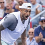 
              Australia's Nick Kyrgios reacts after scoring on a drop shot against Poland's Hubert Hurkacz during the quarterfinals of the National Bank Open tennis tournament on Friday, Aug. 12, 2022, in Montreal. (Paul Chiasson/The Canadian Press via AP)
            