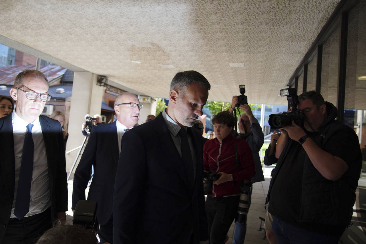 Former Manchester United footballer Ryan Giggs arrives at Manchester Crown Court in Manchester, Eng...