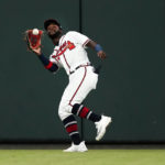 
              Atlanta Braves center fielder Michael Harris II (23) catches a fly ball from New York Mets' Brandon Nimmo during the sixth inning of a baseball game Tuesday, Aug. 16, 2022, in Atlanta. (AP Photo/John Bazemore)
            