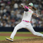 
              San Diego Padres relief pitcher Josh Hader works against a Washington Nationals batter during the ninth inning of a baseball game Friday, Aug. 19, 2022, in San Diego. (AP Photo/Gregory Bull)
            