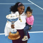 
              FILE - Serena Williams holds her daughter Alexis Olympia Ohanian Jr., and the ASB trophy after winning her singles finals match against Jessica Pegula at the ASB Classic in Auckland, New Zealand, Sunday, Jan 12, 2020. Serena Williams says she is ready to step away from tennis after winning 23 Grand Slam titles, turning her focus to having another child and her business interests. “I’m turning 41 this month, and something’s got to give,” Williams wrote in an essay released Tuesday, Aug. 9, 2022, by Vogue magazine. (Chris Symes/Photosport via AP, File)
            