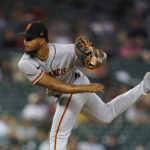 
              San Francisco Giants relief pitcher Camilo Doval (75) throws against the Detroit Tigers in the ninth inning of a baseball game in Detroit, Tuesday, Aug. 23, 2022. (AP Photo/Paul Sancya)
            