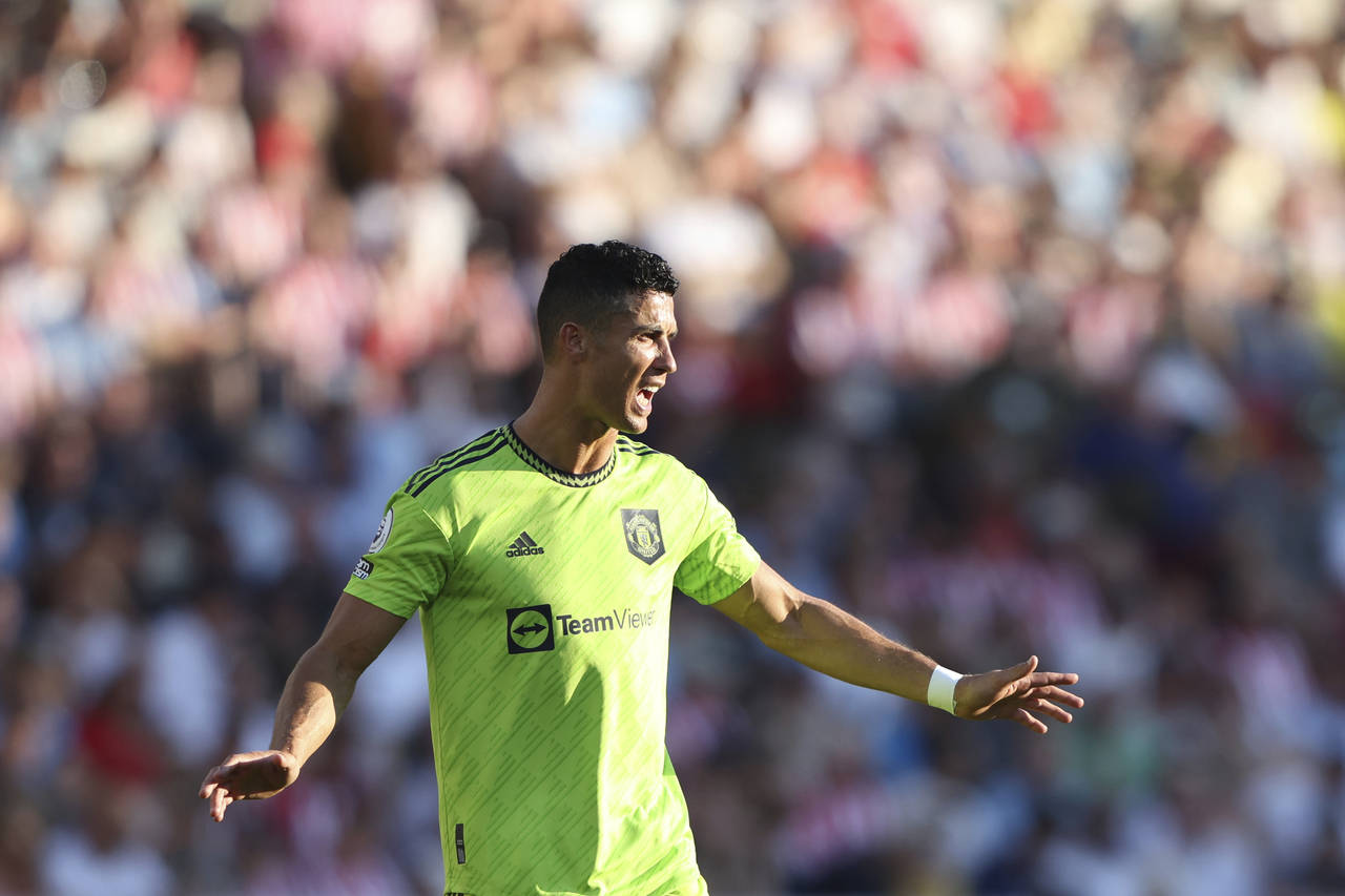 Manchester United's Cristiano Ronaldo reacts to his teammates during the English Premier League soc...