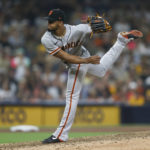
              San Francisco Giants relief pitcher Camilo Doval delivers against the San Diego Padres during the ninth inning of a baseball game, Monday, Aug. 8, 2022, in San Diego. (AP Photo/Mike McGinnis)
            