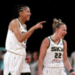 
              Chicago Sky forward Candace Parker and guard Courtney Vandersloot (22) celebrate at a time out during the second half of a WNBA basketball playoff game against the New York Liberty Tuesday, Aug. 23, 2022, in New York. The Chicago Sky won 90-72. (AP Photo/Noah K. Murray)
            