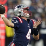 
              New England Patriots quarterback Bailey Zappe throws a pass against the Carolina Panthers during the second half of a preseason NFL football game Friday, Aug. 19, 2022, in Foxborough, Mass. (AP Photo/Charles Krupa)
            