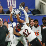 
              Cincinnati Bengals' Allan George, right, defends against a pass to New York Giants' David Sills V during the first half of a preseason NFL football game Sunday, Aug. 21, 2022, in East Rutherford, N.J. (AP Photo/John Munson)
            