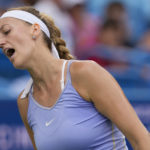
              Petra Kvitova, of the Czech Republic, reacts after losing a point to Caroline Garcia, of France, during the women's singles final of the Western & Southern Open tennis tournament Sunday, Aug. 21, 2022, in Mason, Ohio. (AP Photo/Jeff Dean)
            