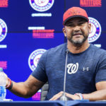 
              Washington Nationals manager Dave Martinez speaks with reporters about the team's recent trades before a baseball game against the New York Mets at Nationals Park, Tuesday, Aug. 2, 2022, in Washington. (AP Photo/Alex Brandon)
            