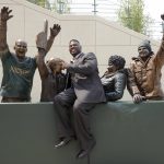 
              FILE - LeRoy Butler, credited with originating the Lambeau Leap, is the first to pose with the piece during the unveiling of the Lambeau Leap sculpture on Harlan Plaza at Lambeau Field in Green Bay, Wis., Friday, Aug. 1, 2014. After starring for the Seminoles, Butler helped recast the safety position in the NFL and restore Green Bay's glory days during a 12-year career that featured five All-Pro selections and landed him in the Pro Football Hall of Fame's Class of 2022.    (Jim Matthews/The Green Bay Press-Gazette via AP, File)
            