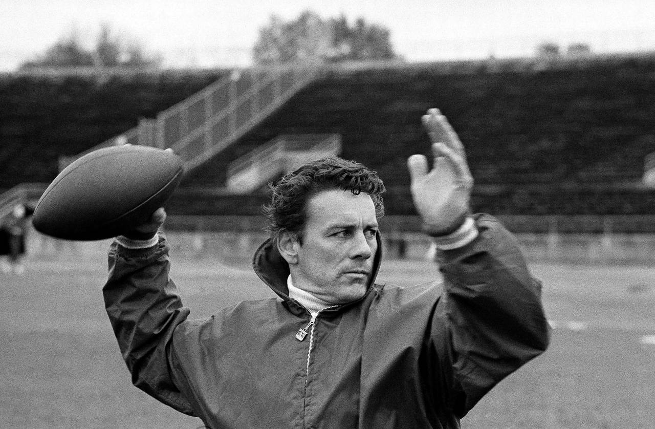 FILE -  Len Dawson of the Kansas City Chiefs running through passing drills with receivers in New O...