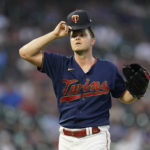 
              Minnesota Twins starting pitcher Sonny Gray reacts during the sixth inning of a baseball game against the Texas Rangers, Monday, Aug. 22, 2022, in Minneapolis. (AP Photo/Abbie Parr)
            