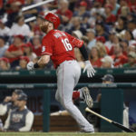 
              Cincinnati Reds' Colin Moran watches his solo home run during the sixth inning of a baseball game against the Washington Nationals, Saturday, Aug. 27, 2022, in Washington. (AP Photo/Luis M. Alvarez)
            