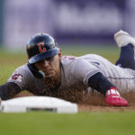 
              Cleveland Guardians' Andres Gimenez slides safely into third during the first inning of a baseball game against the Detroit Tigers, Wednesday, Aug. 10, 2022, in Detroit. (AP Photo/Carlos Osorio)
            
