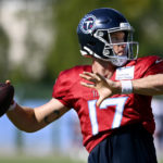 
              Tennessee Titans quarterback Ryan Tannehill (17) throws a pass during a combined NFL football training camp with the Tampa Bay Buccaneers, Thursday, Aug. 18, 2022, in Nashville, Tenn. (AP Photo/Mark Zaleski)
            