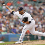
              Detroit Tigers relief pitcher Joe Jimenez throws against the Los Angeles Angels in the eighth inning of a baseball game in Detroit, Saturday, Aug. 20, 2022. (AP Photo/Paul Sancya)
            