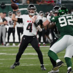 
              Atlanta Falcons quarterback Desmond Ridder (4) passes during the first half of an NFL football game against the New York Jets, Monday, Aug. 22, 2022, in East Rutherford, N.J. (AP Photo/Julia Nikhinson)
            