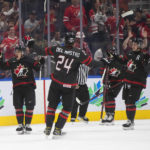 
              Canada celebrates a goal against Switzerland during the first period in a quarterfinal in the IIHF junior world hockey championships Wednesday, Aug. 17, 2022, in Edmonton, Alberta. (Jason Franson/The Canadian Press via AP)
            