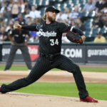 
              Chicago White Sox starting pitcher Michael Kopech winds up during the first inning of a baseball game against the Houston Astros Wednesday, Aug. 17, 2022, in Chicago. (AP Photo/Charles Rex Arbogast)
            