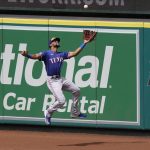 
              Texas Rangers center fielder Leody Taveras makes a catch on a ball hit by Los Angeles Angels' Luis Rengifo during the seventh inning of a baseball game Sunday, July 31, 2022, in Anaheim, Calif. (AP Photo/Mark J. Terrill)
            