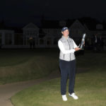 
              South Africa's Ashleigh Buhai poses for the media holding the trophy after winning the Women's British Open golf championship, during the presentation ceremony in Muirfield, Scotland, Sunday, Aug. 7, 2022. (AP Photo/Scott Heppell)
            