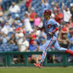 
              Philadelphia Phillies' Nick Maton runs the basses after hitting a two-run home run off of Washington Nationals relief pitcher Cory Abbott during the fourth inning of a baseball game, Sunday, Aug. 7, 2022, in Philadelphia. (AP Photo/Matt Rourke)
            
