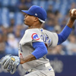 
              Chicago Cubs starting pitcher Marcus Stroman throws to a Toronto Blue Jays batter during the first inning of a baseball game Tuesday, Aug. 30, 2022, in Toronto. (Jon Blacker/The Canadian Press via AP)
            