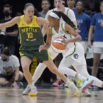 
              Seattle Storm guard Sue Bird (10) defends as Minnesota Lynx guard Moriah Jefferson, right, drives toward the basket during the first half of a WNBA basketball game Wednesday, Aug. 3, 2022, in Seattle. (AP Photo/Ted S. Warren)
            