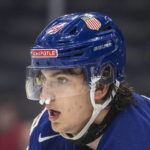 
              USA's Matt Knies (89) wears nose plugs after being injured against Sweden during second period IIHF World Junior Hockey Championship action in Edmonton, Alberta, on Sunday, Aug. 14, 2022. (Jason Franson/The Canadian Press via AP)
            