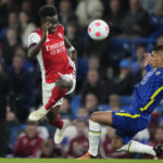
              FILE- Arsenal's Eddie Nketiah, left vies for the ball with Chelsea's Thiago Silva during the English Premier League soccer match between Chelsea and Arsenal at Stamford Bridge in London, on April 20, 2022. NBC celebrates a milestone this weekend when it begins its 10th season of covering the Premier League. (AP Photo/Frank Augstein, File)
            