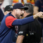 
              Minnesota Twins manager Rocco Baldelli argues with umpires during the fifth inning of a baseball game against the Houston Astros Tuesday, Aug. 23, 2022, in Houston. Baldelli was ejected from the game. (AP Photo/David J. Phillip)
            