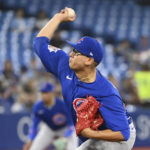 
              Chicago Cubs starting pitcher Javier Assad throws to a Toronto Blue Jays batter in first-inning baseball game action in Toronto, Monday, Aug. 29, 2022. (Jon Blacker/The Canadian Press via AP)
            
