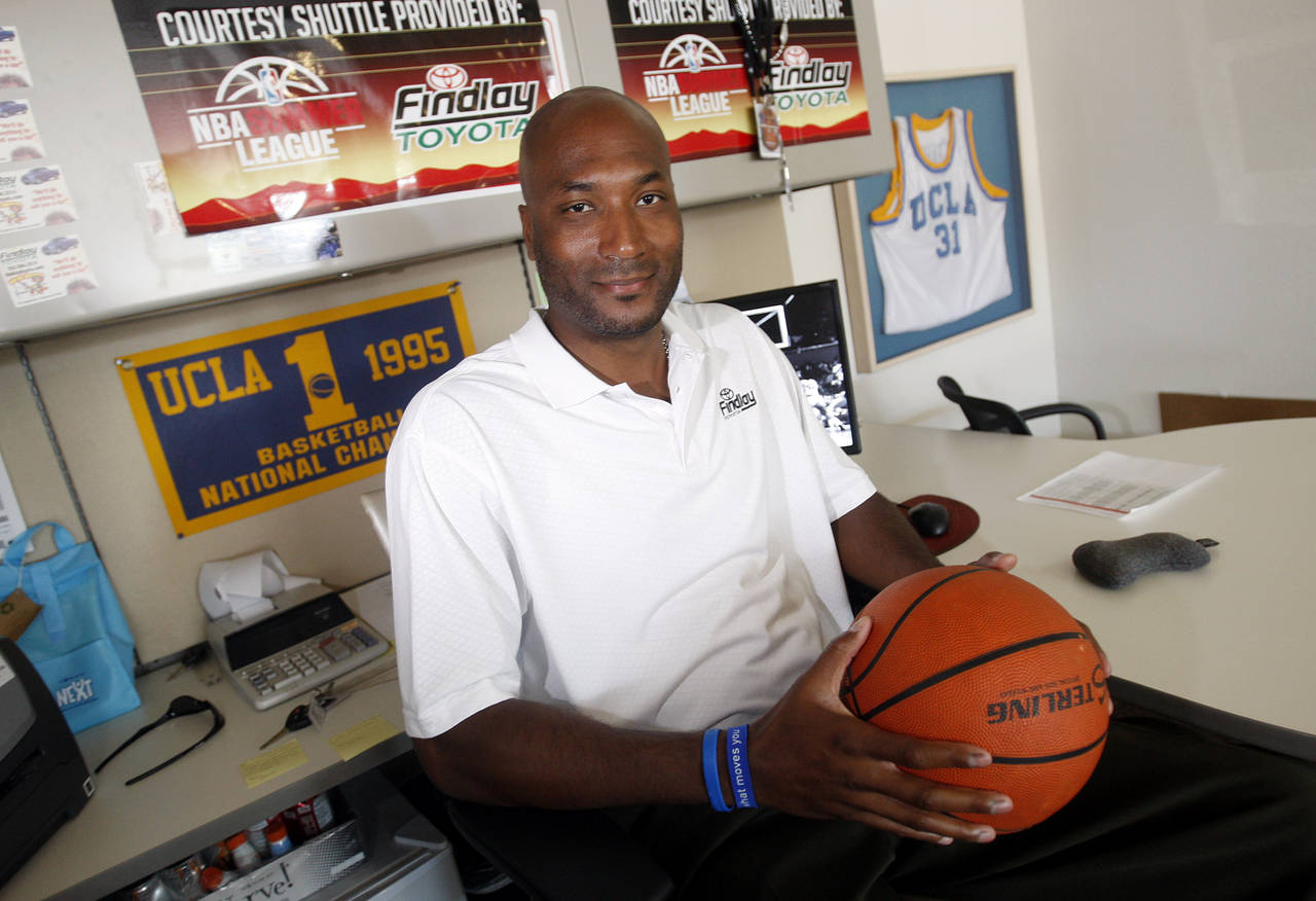 FILE - In this Sept. 18, 2010, file photo, former UCLA basketball player Ed O'Bannon Jr. sits in hi...