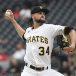 
              Pittsburgh Pirates starter JT Brubaker pitches against the Boston Red Sox during the first inning of a baseball game Thursday, Aug. 18, 2022, in Pittsburgh. (AP Photo/Philip G. Pavely)
            