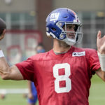 
              New York Giants quarterback Daniel Jones passes in a drill during training camp at the NFL football team's practice facility, Thursday, July 28, 2022, in East Rutherford, N.J. (AP Photo/John Minchillo)
            