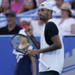 
              Nick Kyrgios, of Australia, reacts during a match against Marcos Giron, of the United States, at the Citi Open tennis tournament in Washington, Tuesday, Aug. 2, 2022. (AP Photo/Carolyn Kaster)
            