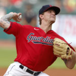 
              Cleveland Guardians starting pitcher Zach Plesac delivers against the Houston Astros during the first inning of a baseball game Thursday, Aug. 4, 2022, in Cleveland. (AP Photo/Ron Schwane)
            