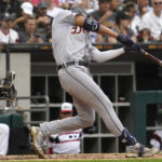 
              Detroit Tigers' Riley Greene hits a single during the third inning of a baseball game against the Chicago White Sox in Chicago, Sunday, Aug. 14, 2022. (AP Photo/Nam Y. Huh)
            