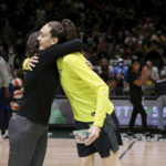 
              Seattle Storm general manager Talisa Rhea, left, hugs forward Breanna Stewart (30) after presenting Stewart with the WNBA Peak Performer Award as she is also honored as The Associated Press WNBA Player of the Year before Game 1 of a WNBA basketball first-round playoff series against the Washington Mystics Thursday, Aug. 18, 2022, in Seattle. (AP Photo/Lindsey Wasson)
            