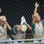 
              Taiwan's Chen Yu-Ting, left, Chen Yu-Ting and Shih Yi-Hung, right, watch from the dugout during the sixth inning of the International Championship baseball game against Curacao at the Little League World Series tournament in South Williamsport, Pa., Saturday, Aug. 27, 2022. Curacao won 1-0. (AP Photo/Tom E. Puskar)
            