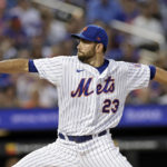 
              New York Mets pitcher David Peterson throws during the first inning of a baseball game against the Colorado Rockies on Saturday, Aug. 27, 2022, in New York. (AP Photo/Adam Hunger)
            