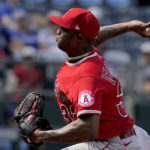 
              Los Angeles Angels relief pitcher Raisel Iglesias throws during the the ninth inning of a baseball game against the Kansas City Royals Wednesday, July 27, 2022, in Kansas City, Mo. The Angels won 4-0. (AP Photo/Charlie Riedel)
            