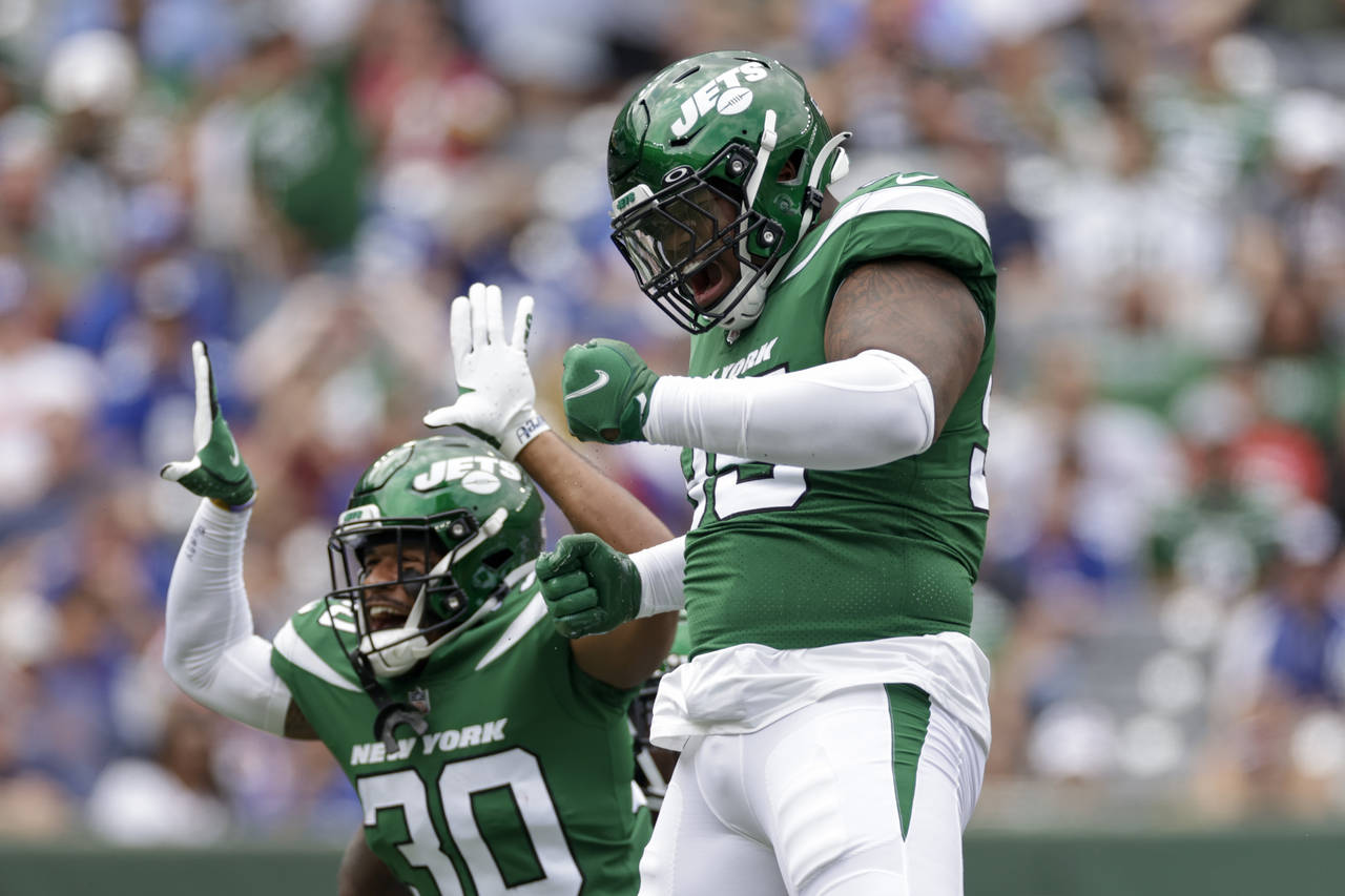 New York Jets cornerback Sauce Gardner (1) runs on a play in the first half  of a preseason NFL football game against the New York Giants, Sunday, Aug.  28, 2022, in East