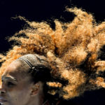 
              FILE - United States' Serena Williams serves to compatriot Nicole Gibbs during their third round match at the Australian Open tennis championship, Saturday, Jan. 21, 2017, in Melbourne, Australia. After nearly three decades in the public eye, few can match Serena Williams' array of accomplishments, medals and awards. Through it all, the 23-time Grand Slam title winner hasn't let the public forget that she's a Black American woman who embraces her responsibility as a beacon for her people. (AP Photo/Andy Brownbill, File)
            