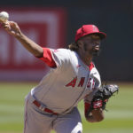 
              Los Angeles Angels' Touki Toussaint pitches against the Oakland Athletics during the first inning of a baseball game in Oakland, Calif., Wednesday, Aug. 10, 2022. (AP Photo/Jeff Chiu)
            